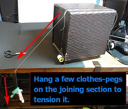 Hanging between clothes-pegs/clothespins, tensioning and straightening