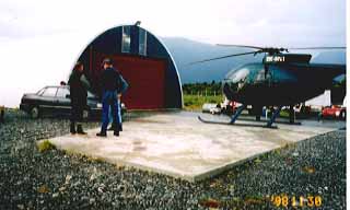 At Mr. Morgan's heliport.